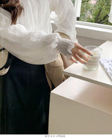 裏起毛スタンドカラーブラウス