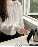 裏起毛スタンドカラーブラウス