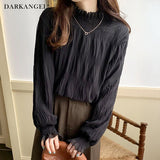 裏起毛スタンドカラーブラウス