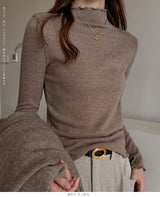 メロウフリルハイネックリブニットトップス