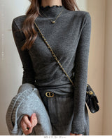 メロウフリルハイネックリブニットトップス