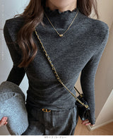 メロウフリルハイネックリブニットトップス