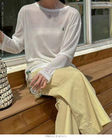 バックボタンシアートップス