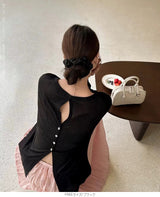 バックボタンシアートップス