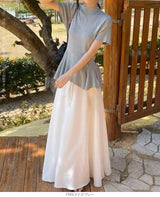 ペプラムニットトップス