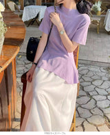 ペプラムニットトップス