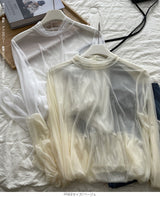 裾フリルシアートップス