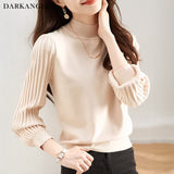 プリーツスリーブニット